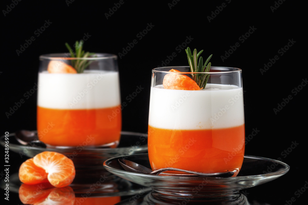 Panna Cotta with tangerines, jelly and rosemary, Italian dessert, home cooking. Copy space
