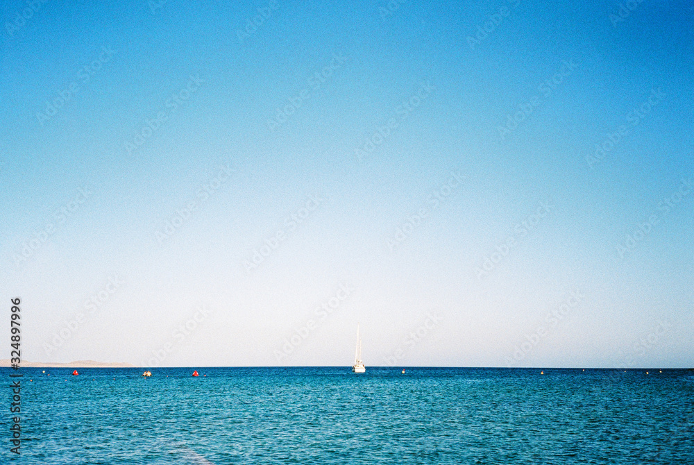 Obraz premium Boat in the Cretan Sea