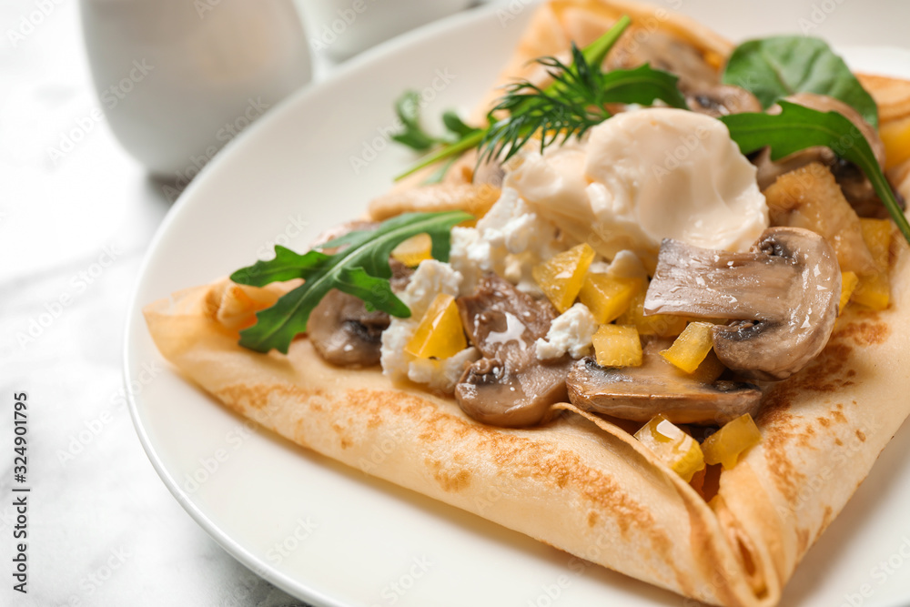 Delicious breakfast with thin pancakes on plate, closeup Delicious breakfast with thin pancakes on plate, closeup