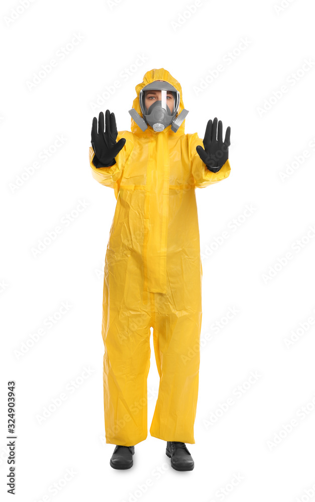 Woman in chemical protective suit making stop gesture on white background. Virus research Woman in chemical protective suit making stop gesture on white background. Virus research