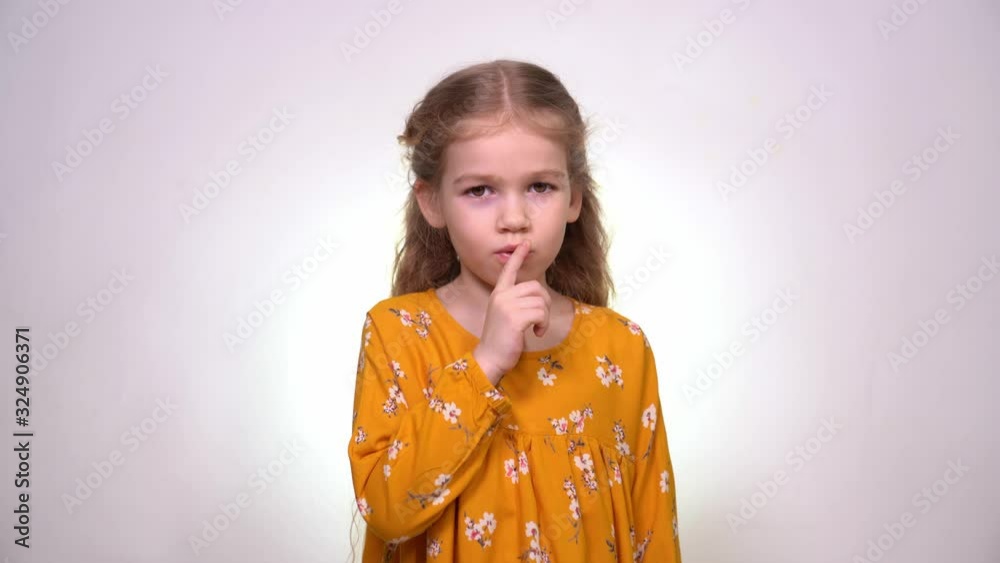 Sign quieter fingers shows beautiful little girl Sign quieter fingers shows beautiful little girl