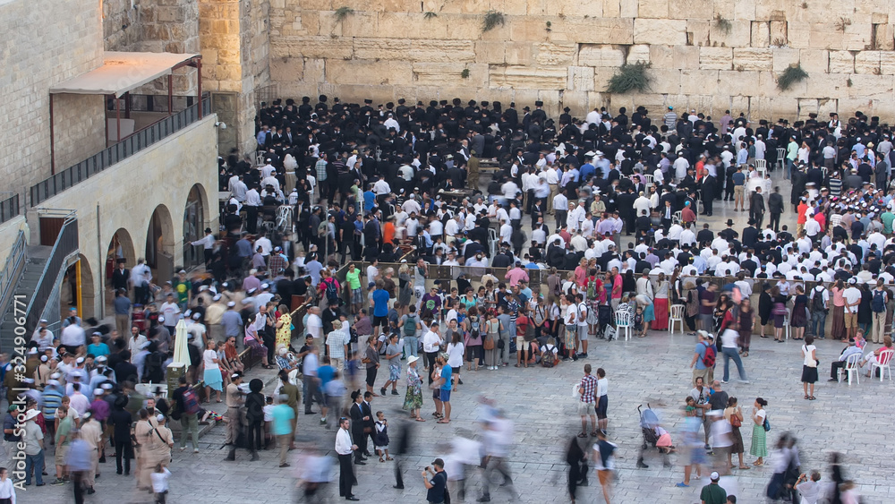 Religious Jews sunset prayer service at the Western Wall, Israel timelapse