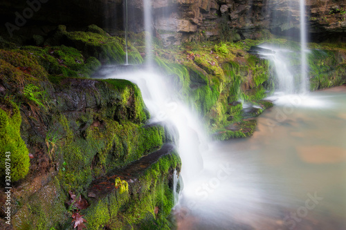 Waterfalls Splashing on Mossy Rocks