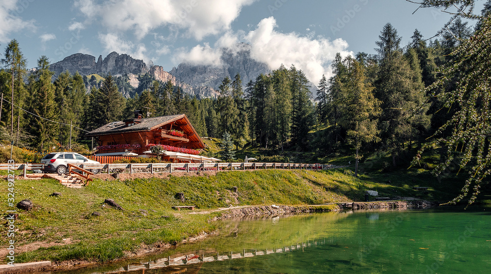 Beautiful natural landscape in the summer time. Italian Dolomites -view on the lake Scin. Beautiful landscape of alpine lake with crystal clear water. Amazing natural background. Dolomites Alps. Italy