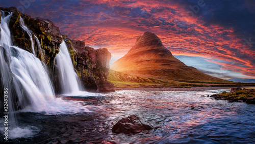 Scenic image of Iceland. Incredible Nature scenery during sunset. Great view on famous Mount Kirkjufell with Colorful  dramatic sky. popular plase for photografers. Best famous travel locations