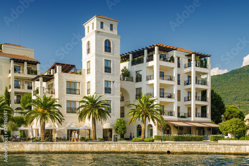 Sunny view of luxury apartments at the port of Tivat, Montenegro.