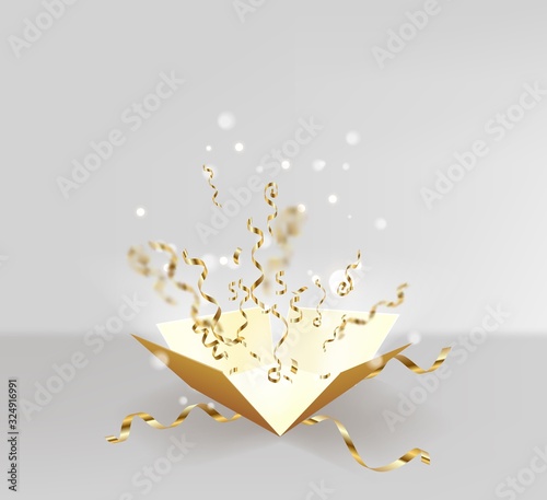 Open box with gold confetti explosion