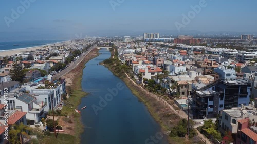 Houses on coastal canal in Marina Del Rey, wide aerial