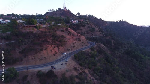 Cars drive on Mulholland Drive, aerial