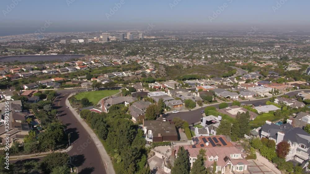 Panning aerial, suburban neighborhood in Newport Beach Panning aerial, suburban neighborhood in Newport Beach
