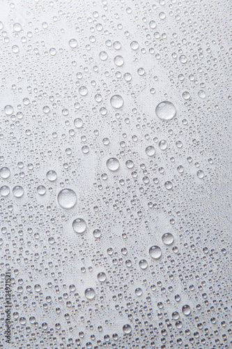 Water rain drops or water drops on white background. Many water drops  on canvas