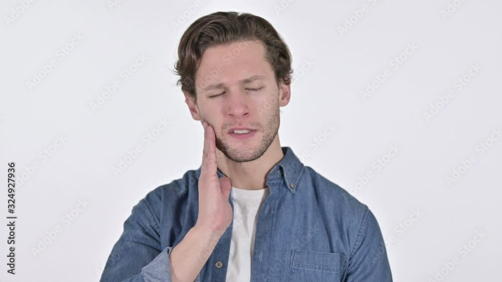 Portrait of Young Man with Toothache on White Background Portrait of Young Man with Toothache on White Background