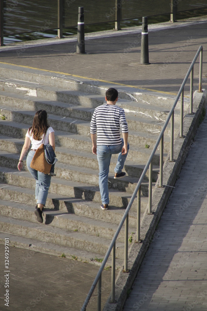 People in a pedestrian street in a summer day in Bilbao