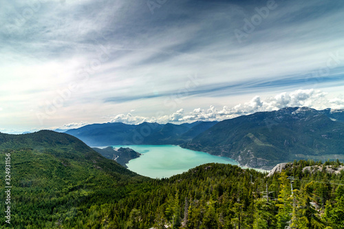 Spectacular scenery of the teal ocean, mountain and clouds, Squamish, BC, Canada