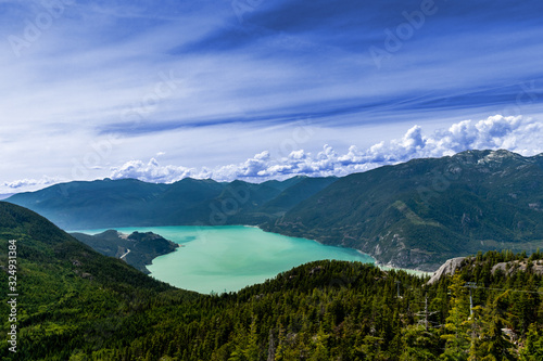 Blue sky, teal ocean and white clouds, Squamish, BC, Canada