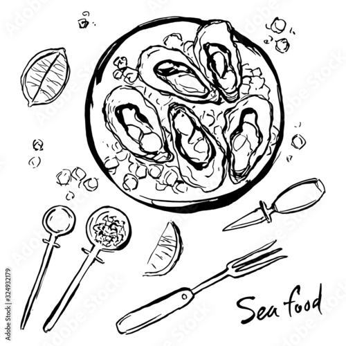 Oysters on a plate and cutlery.