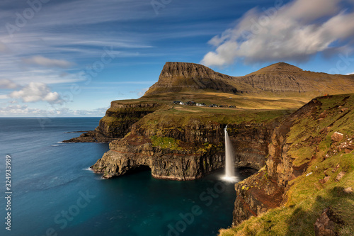 Gasadalur village and its iconic waterfall, Vagar, Faroe Islands, Denmark