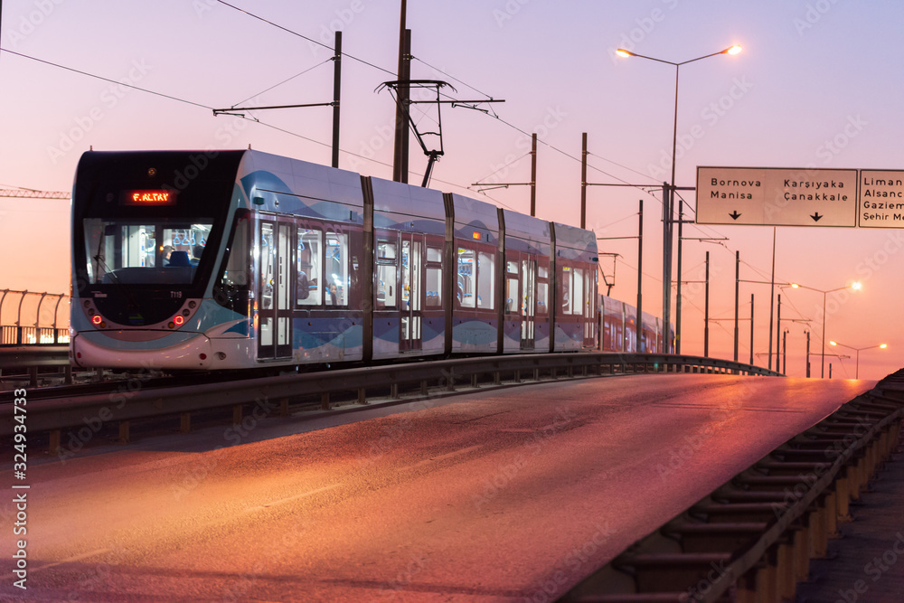 Izmir, Konak/Turkey-January 31 2020:Tram carrying passengers at sunset.