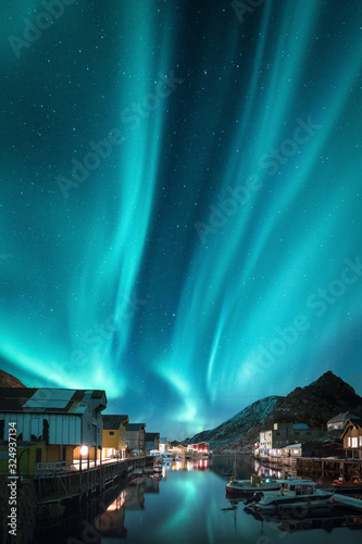 Norway, Vesteralen archipelago, Langoya island, Nyksund, Northern lights above fishing village photo