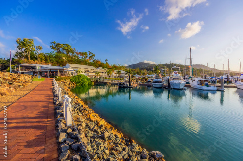 Australia, Queensland, Boats in harbor near Airlie Beach photo