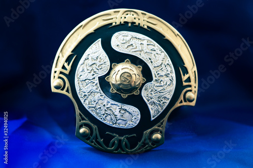 Tournament award online game Aegis on a dark blue background.