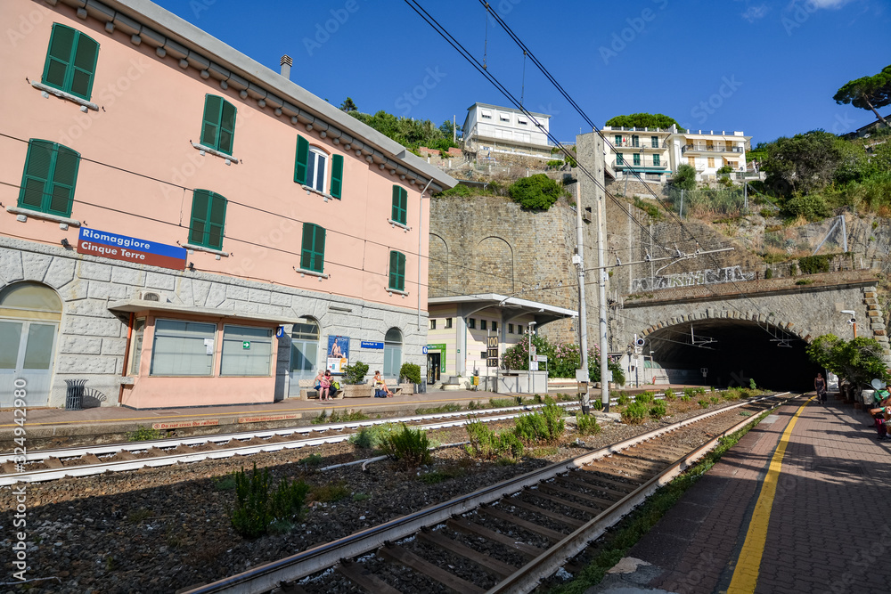 RIOMAGGIORE, ITALY - August 15, 2019: The train station and the train tracks at Riomaggiore at Cinque Terre