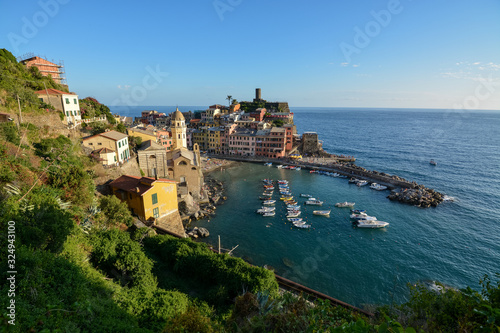 View of Vernazza and the ocean during sunset at Cinque Terre