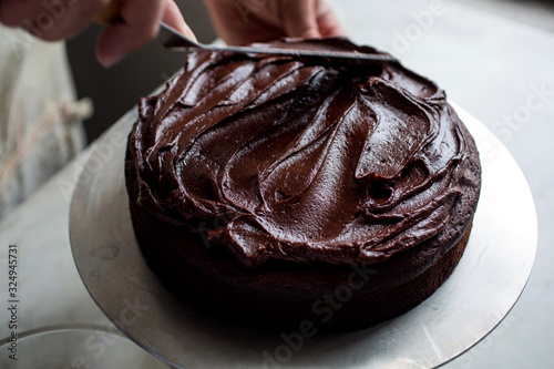 Directly above view of icing or frosting chocolate cake