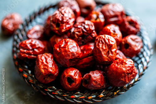 Close up of dried red dates in bowl