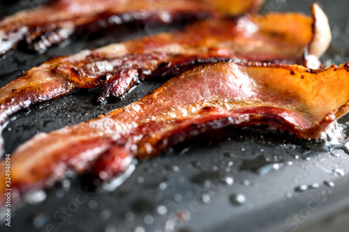 Close up view of roasted bacon photo