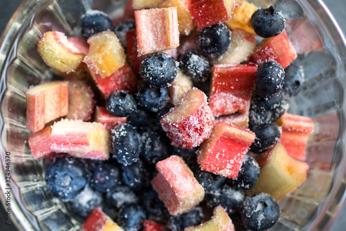 Close up view of blueberry and rhubarb pie filling in bowl