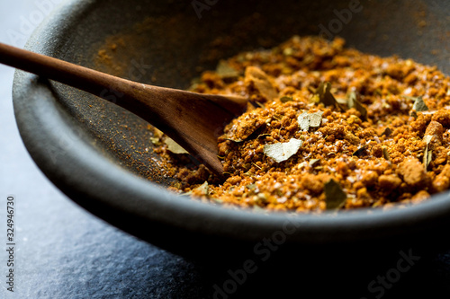 Close up view of spice rub in bowl photo
