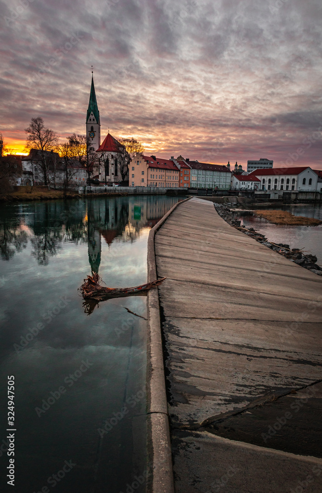 Sunset in Kempten with river and church