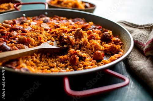 Close up view of sausage paella in pan