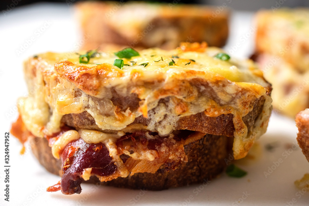 Close up view of ham and cheese croque with Dijon Close up view of ham and cheese croque with Dijon