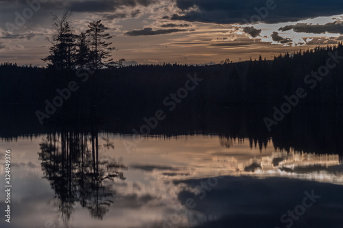 Fototapeta Naklejka Na Ścianę i Meble -  Beautiful sunset on the lake,natural background, long shutter speed