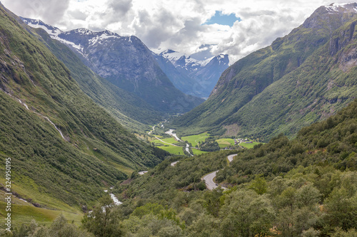 Norway, Beautiful View Of Mountain with cloudy sky and Green Valley, Norway Mountain Landscape selective focus