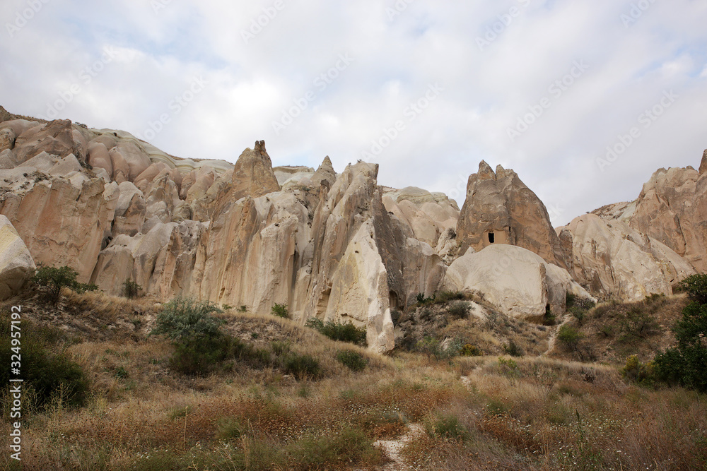 Fototapeta premium Unusually shaped volcanic rocks in the Valley of Swords near the village of Goreme in the Cappadocia region of Turkey.