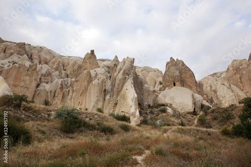 Unusually shaped volcanic rocks in the Valley of Swords near the village of Goreme in the Cappadocia region of Turkey.