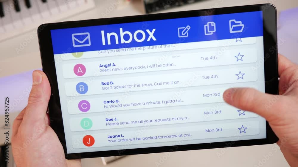 email messages inbox browsing and selecting a conversation to read on a tablet screen. email messages inbox browsing and selecting a conversation to read on a tablet screen.