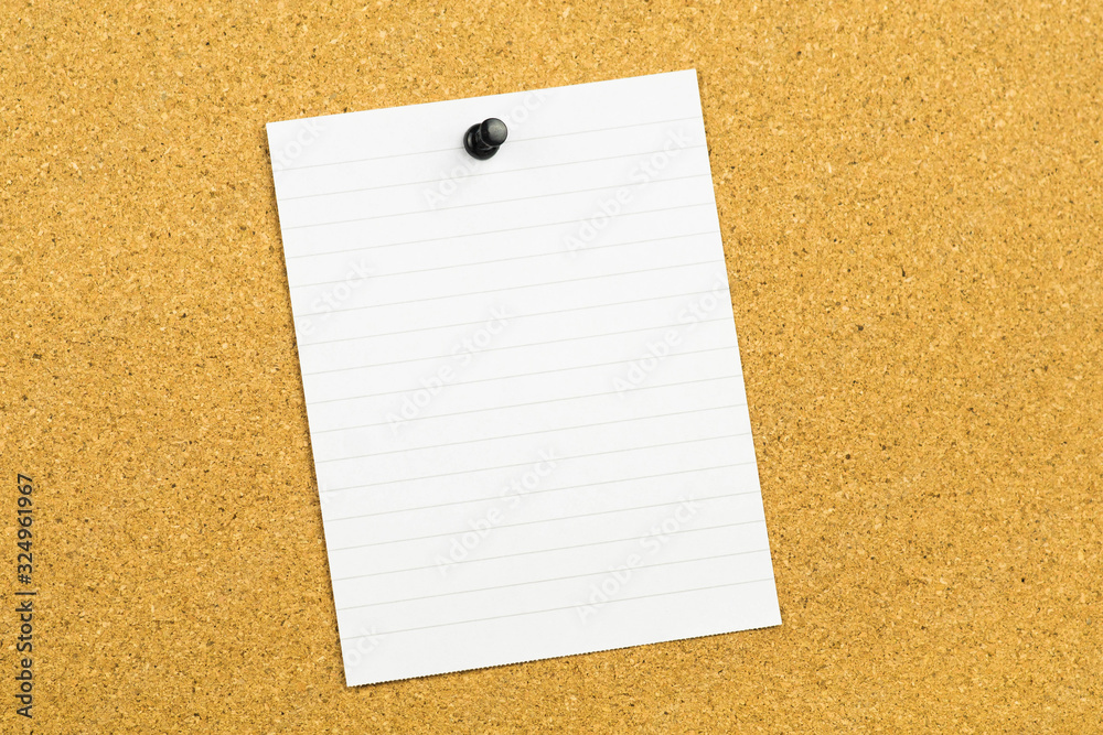 empty white sticky note hanging on cork card board with black pin empty white sticky note hanging on cork card board with black pin