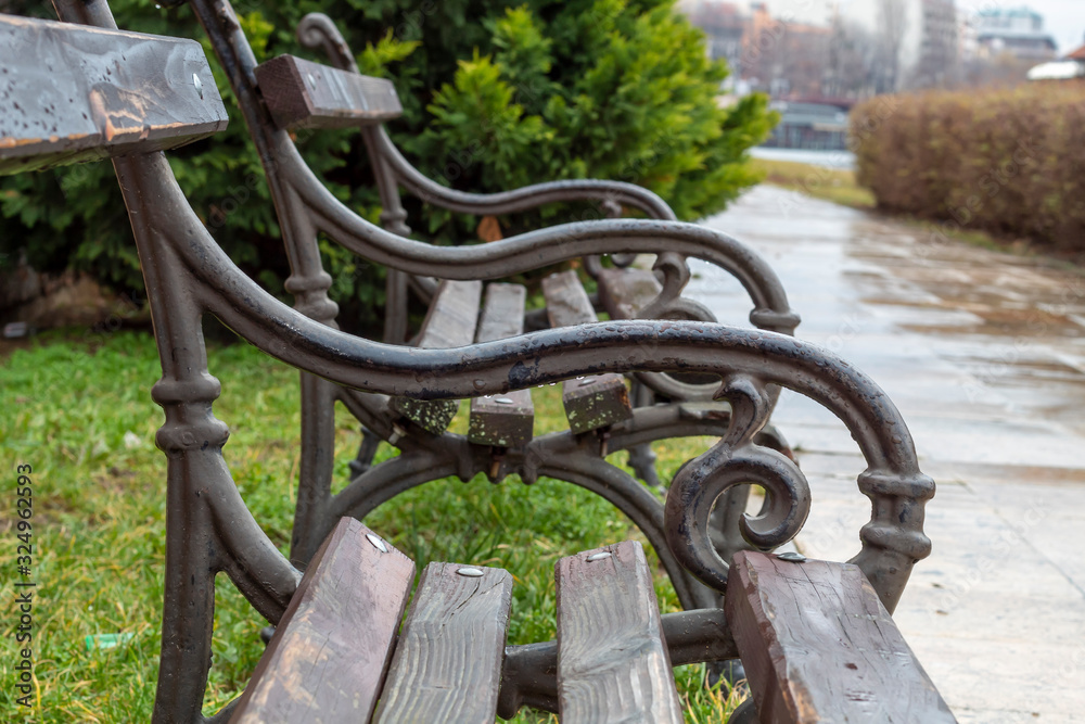 Close Up Benches on Rainy Day With Water Drops