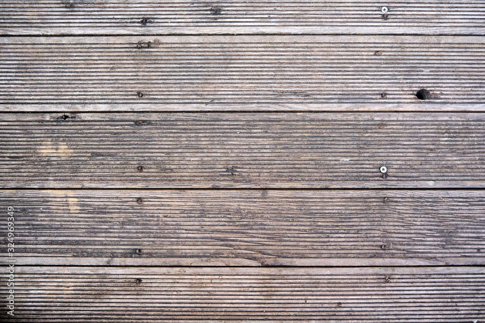 Fototapeta premium A closeup shot of old wooden planks background texture