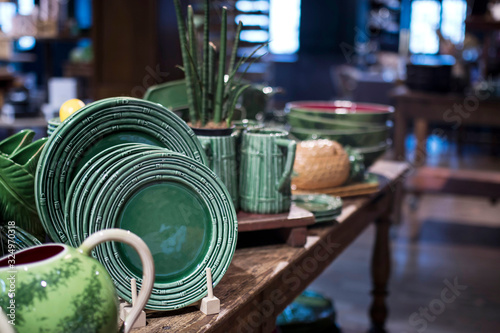 Εκτύπωση καμβά White ceramic plates on a shelf in a store.