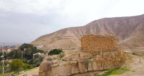 Drone around ancient gate to enter the road between Jericho and Jerusalem.