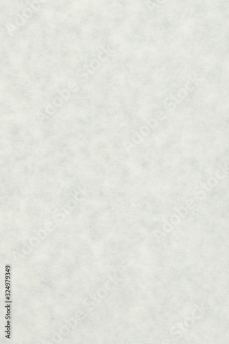 abstract splotchy light grey parchment paper background