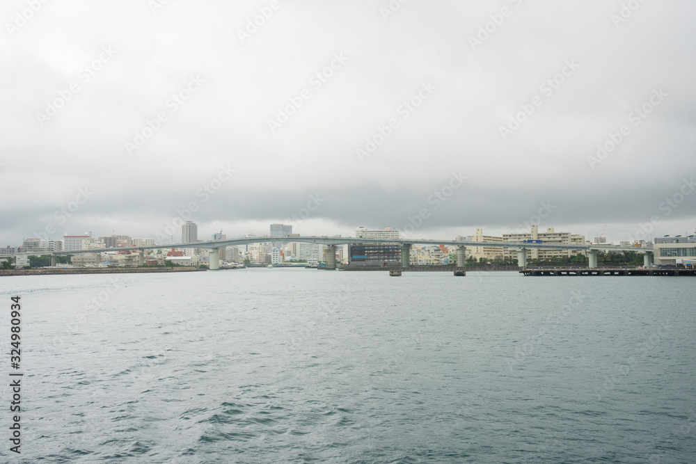 Landscape view of Naha Cruise Terminal in rainy day in Naha, Okinawa, Japan Landscape view of Naha Cruise Terminal in rainy day in Naha, Okinawa, Japan