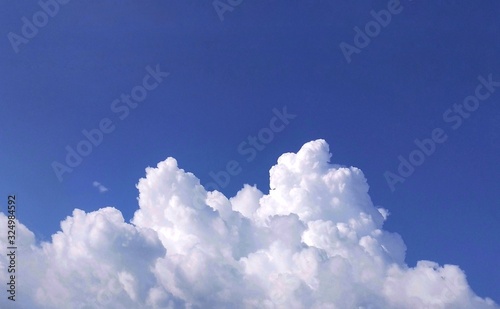White could and blue sky