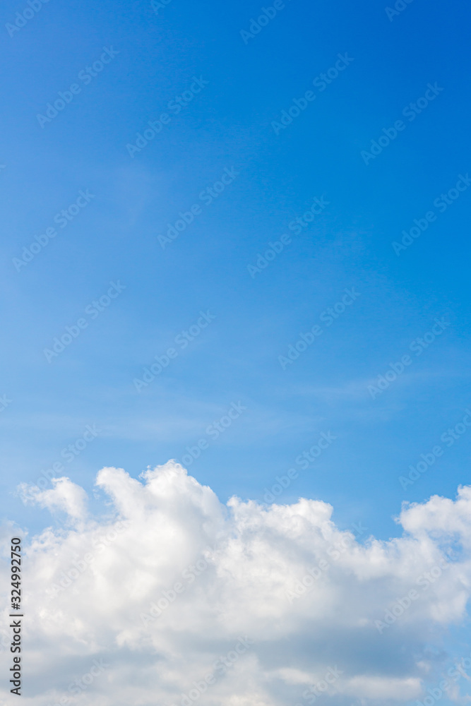 blue sky background with tiny clouds. Sky is a beautiful patterned cloud in the daytime during the summer is a panoramic image. blue sky background with tiny clouds. Sky is a beautiful patterned cloud in the daytime during the summer is a panoramic image.