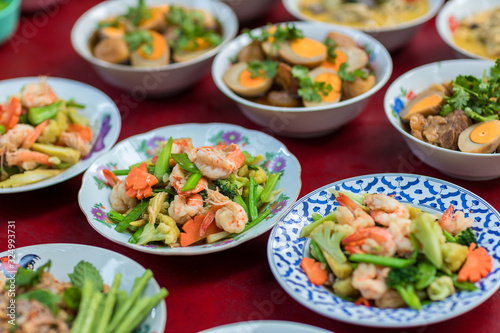 Stir fried vegetables in the plate. Mix vegetable on the cooking pan. Selective focus. Healthy stir fried vegetables in the plate and ingredients close up. Fried vegetables Thai style on plate.
